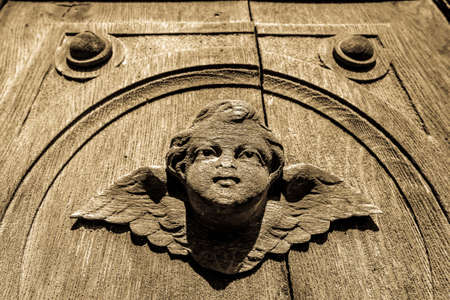 historic angel at a church in austria - photoの写真素材