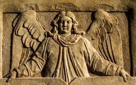 historic angel at a church in austria - photoの写真素材