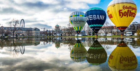 Stuttgart, Germany - December 18: Hot air balloons from the company Stuttgarter HofbrÃ¤u, BW-Bank and Stadtwerke in the old town of Stuttgart on December 18, 2021のeditorial素材