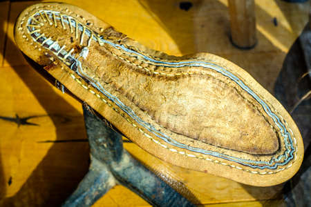 shoemaking with old shoe lasts - photo