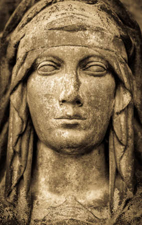 beautiful historic relief at a cemetery - photo