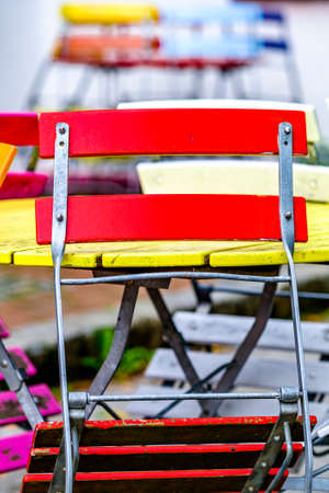 colorful folding chairs at a beergarden - photoの写真素材