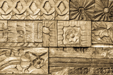 old wooden ornament at a historic doorの写真素材