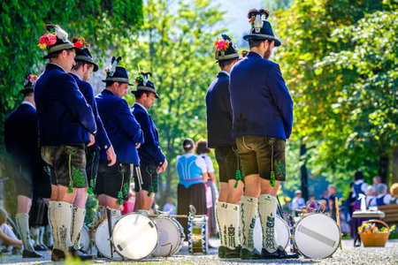 Kochel am See, Germany - August, 15: Typical bavarian marching band with traditional costume on Maria Himmelfahrt holiday in Kochel am See on August, 15, 2021のeditorial素材