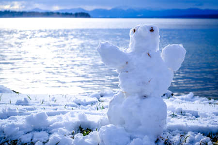 nice snowman at a park - photoの写真素材