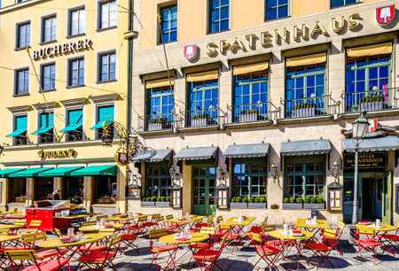 Munich, Germany - March 21: Table and chairs at the restaurant "Spatenhaus" in Munich on March 21, 2019のeditorial素材