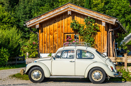 Bad Tolz, Germany - July 28: vintage car VW Beetle at the kurparkviertel in Bad Tolz on July 28, 2020のeditorial素材