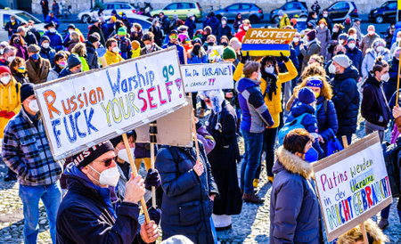 Munich, Germany - February 27: demonstrators against the invasion of russia into ukraine in the city...