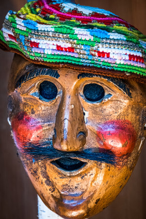 Mittenwald, Germany - February 19: typical historic wooden mask to drive out the winter called 'maschkera' in Mittenwald on February 19, 2022のeditorial素材
