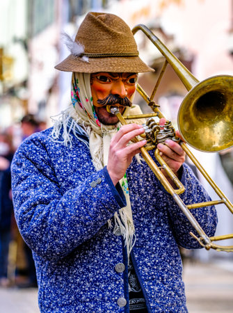 Mittenwald, Germany - February 24: Participants of a parade with traditional historic costumes to drive out the winter called 'maschkera' in Mittenwald on February 24, 2022のeditorial素材