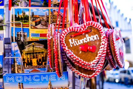 Munich, Germany - March 10: typical bavarian ginger bread hearts and postcards at a souvenir stand in Munich on March 10, 2022のeditorial素材