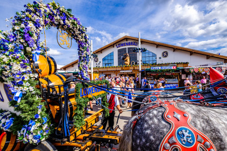 Munich, Germany - September 27: coach and tourists at the lowenbrau tent at the oktoberfest in munich on September 27, 2019のeditorial素材