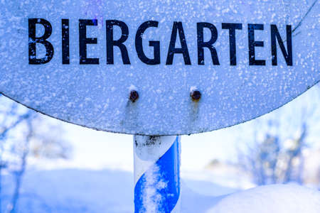 typical bavarian beergarden sign - translation: beergarden - photoの写真素材