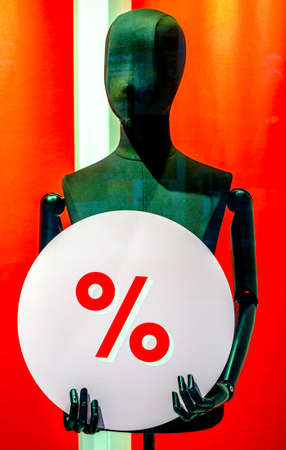 typical sale sign at a mannequin - photo