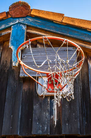 typical basketball hoop at a farm - photoの写真素材