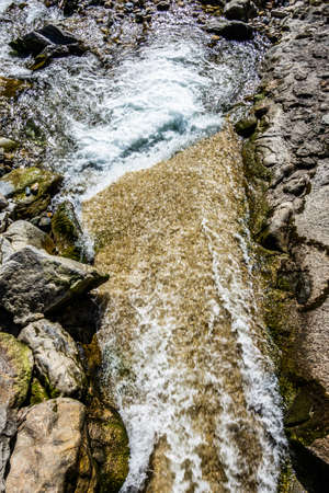 small waterfall at the alps - photo
