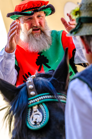 Freising, Germany - April 28: participants in a parade on "the beer day" with historical costumes in the old town of Freising on April 28, 2022のeditorial素材