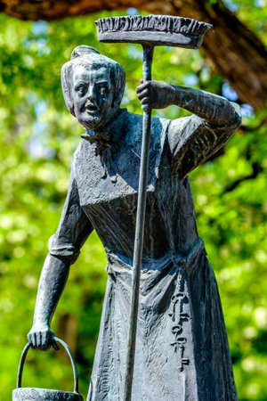 Munich, Germany - May 19: famous statue on a well at the munich viktualienmarkt on May 19, 2022のeditorial素材