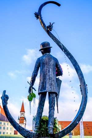 Munich, Germany - December 21: famous statue on a well at the munich viktualienmarkt on December 21, 2021のeditorial素材