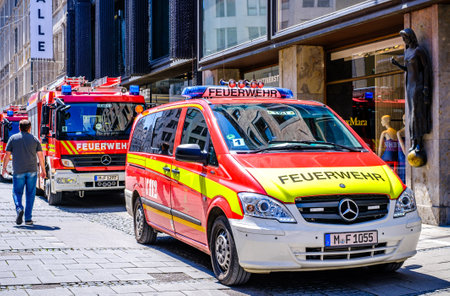 Munich, Germany - May 15: typical fire department truck at the old town of Munich on May 15, 2022のeditorial素材