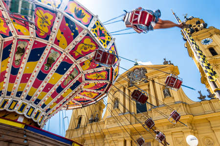 Munich, Germany - June 19: annual city founding festival with stalls, carousel, food stalls and entertainment at the old town of Munich on June 19, 2022のeditorial素材