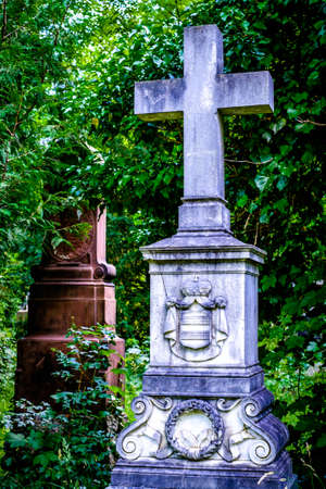 old gravestone at a cemetery - photoの写真素材
