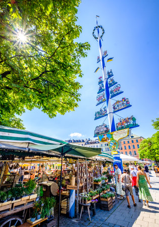 Munich, Germany - July 28: typical stands and pedestrians at the famous viktualienmarkt in Munich on July 28, 2022のeditorial素材