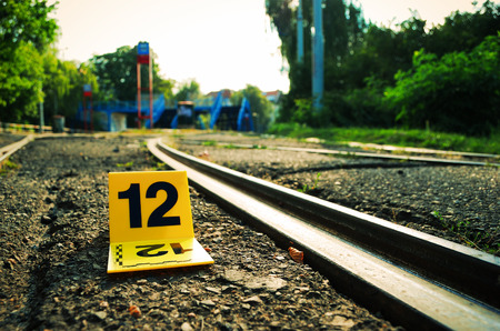 Crime Scene Evidence Marker Near Railsの写真素材