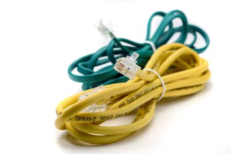 Yellow and Green Network Cables Tied Together