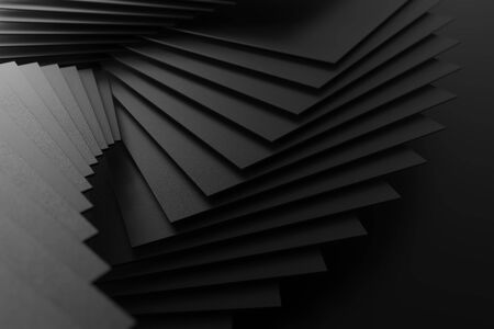 3D rendering of black stacked squares on black matte surfaceの写真素材