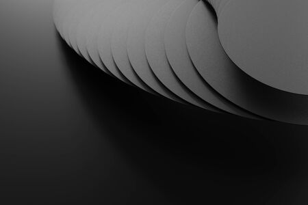 3D rendering of black stacked circles on black matte surfaceの写真素材