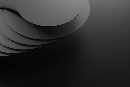 3D rendering of black stacked circles on black matte surfaceの写真素材