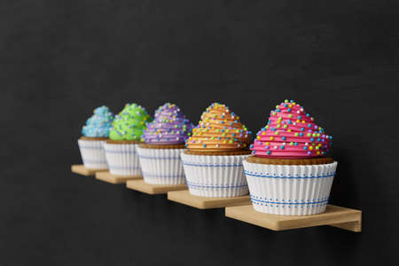 3D rendering of color cupcakes on shelves, each cupcake has white cupcake and color whipped cream,...