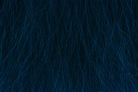3D rendering of a closeup view of a bunch of blue hair in a wavy curved style, dark abstract backgroundの写真素材