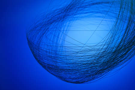 Beautiful abstract wavy curves, blue digital technology background, selective focus, corporate conceptの写真素材