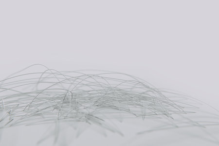 Abstract connected curves, metal lines passing through the surface, white background, corporate designの写真素材