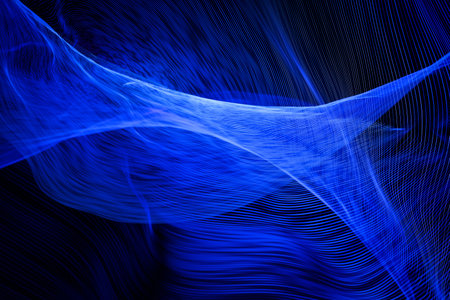 Beautiful abstract wavy curves, dark blue digital technology background, selective focus, corporate conceptの写真素材