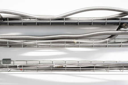 Metal pipes for transfer of liquid nitrogen, industry background, scientific research theme, pipes...