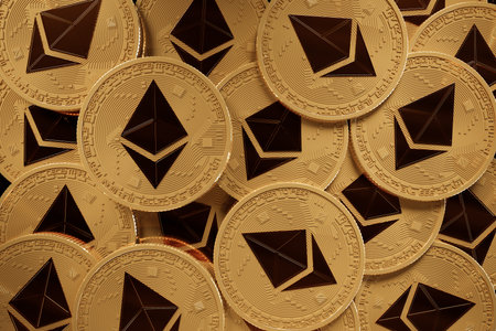 3D rendering of close-up of metal Ethereum cryptocurrency coins, electronic decentralized money...