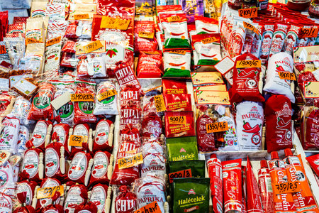 Budapest, Hungary - March 12 2022: Old market in Budapest, counter with national spices. Paprika in different packagingのeditorial素材