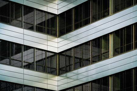 Modern Geometric Facade with Glass and Metal Louversの写真素材