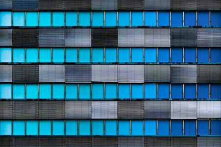 Vibrant Blue Facade with Geometric Window Patterns