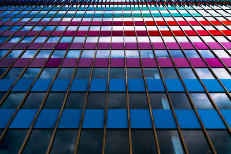 Vibrant Multicolored Facade with Geometric Window Patternsの写真素材