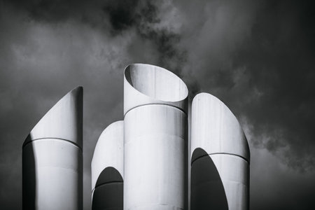 Modern Architectural Sculpture Against Dramatic Skiesの写真素材