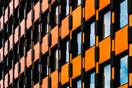 Vibrant Modern Facade with Geometric Patterns and Reflective Windows
