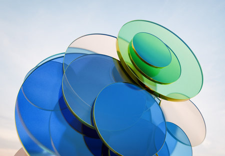 3D rendering of Overlapping Transparent Green and Blue Glass Discs Creating Soft Abstract Patterns...