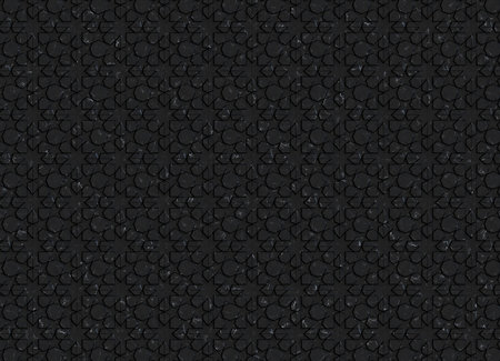 Decorative surface composed of square tiles made of black marble arranged in a repeating grid. The...