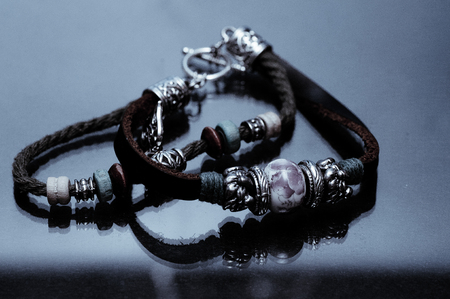 Handmade leather bracelet on glass