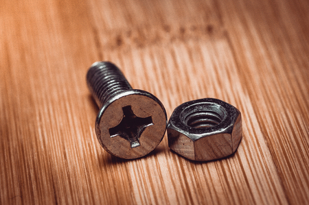 Bolts and nuts on the tableの写真素材
