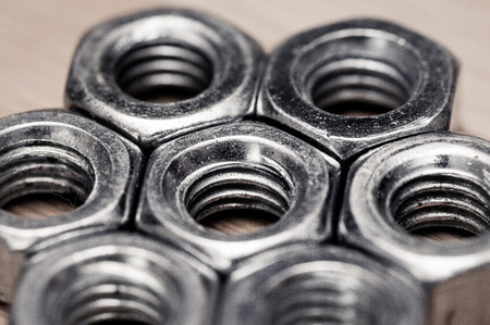 Bolts and nuts on the tableの写真素材